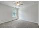 Bright bedroom with a ceiling fan, window with blinds, and gray carpet flooring at 211 Saxony Loop, Summerville, SC 29486