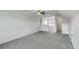 Expansive bonus room with soft carpet and neutral walls offering versatility and comfort at 211 Saxony Loop, Summerville, SC 29486