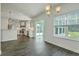 An open dining area offers views of the kitchen and outside patio for flexible living at 211 Saxony Loop, Summerville, SC 29486