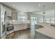 Bright, modern kitchen featuring stainless steel appliances, and hardwood floors at 211 Saxony Loop, Summerville, SC 29486