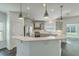 Modern kitchen with stainless steel appliances, granite countertops, and ample cabinet space at 211 Saxony Loop, Summerville, SC 29486
