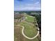 Stunning aerial view of the verdant golf course, with pristine greens, manicured fairways, and water features at 2267 N Marsh Dr, Mount Pleasant, SC 29466