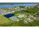 A landscape of the community highlighting the beautiful ponds and tennis courts at 2267 N Marsh Dr, Mount Pleasant, SC 29466