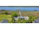 Stunning aerial view of the pier that extends into the water from the community at 2267 N Marsh Dr, Mount Pleasant, SC 29466