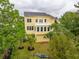 Aerial view of the home, showcasing the spacious backyard and upper level deck at 2267 N Marsh Dr, Mount Pleasant, SC 29466