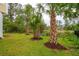 Lush backyard featuring well-manicured lawn and mature landscaping at 2267 N Marsh Dr, Mount Pleasant, SC 29466