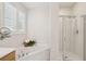 Beautiful bathroom features large soaking tub and glass shower stall at 2267 N Marsh Dr, Mount Pleasant, SC 29466