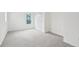 Bedroom featuring a window, carpet, and a double door closet at 2267 N Marsh Dr, Mount Pleasant, SC 29466