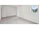 A bedroom featuring a round window and neutral carpet at 2267 N Marsh Dr, Mount Pleasant, SC 29466