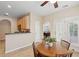 Inviting breakfast nook with natural lighting and views into the dining room and kitchen at 2267 N Marsh Dr, Mount Pleasant, SC 29466