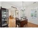 Open-concept dining room with hardwood floors and seamless flow to other living spaces at 2267 N Marsh Dr, Mount Pleasant, SC 29466