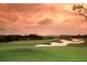 Picturesque golf course with lush green fairways, sand traps, and a beautiful horizon under a cloudy sky at 2267 N Marsh Dr, Mount Pleasant, SC 29466