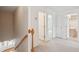 Hallway view with stairway and access to other rooms and bathrooms at 2267 N Marsh Dr, Mount Pleasant, SC 29466