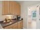 Charming kitchenette with light wood cabinetry and modern coffee station at 2267 N Marsh Dr, Mount Pleasant, SC 29466