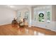 Comfortable living room with hardwood floors, shuttered windows, and traditional furnishings at 2267 N Marsh Dr, Mount Pleasant, SC 29466