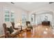 Inviting living room showcases hardwood flooring, arched doorways, and neutral paint, creating a warm ambiance at 2267 N Marsh Dr, Mount Pleasant, SC 29466