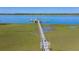Scenic shot of the pier, surrounded by lush marshland and calm waters at 2267 N Marsh Dr, Mount Pleasant, SC 29466