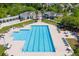 A gorgeous swimming pool with lane markers is surrounded by seating and landscaping at 2267 N Marsh Dr, Mount Pleasant, SC 29466