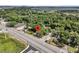 This aerial view shows the property's location near a road, surrounded by trees, and close to local amenities at 2373 Sorentrue Ave, North Charleston, SC 29405