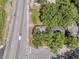 Aerial shot of a property located near a road, surrounded by lush greenery and mature trees at 2373 Sorentrue Ave, North Charleston, SC 29405