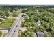Aerial View of the home and property nestled between mature trees with a view of the road at 2373 Sorentrue Ave, North Charleston, SC 29405