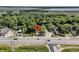 An aerial shot showcases the home's location near a river and bridge, surrounded by lush greenery and convenient roads at 2373 Sorentrue Ave, North Charleston, SC 29405