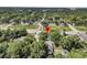 Overhead view of a charming home nestled amongst lush trees in a serene neighborhood location at 2373 Sorentrue Ave, North Charleston, SC 29405