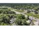 Scenic aerial view of a property with a large lot and mature trees, near a road with easy access at 2373 Sorentrue Ave, North Charleston, SC 29405