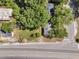 Aerial view of a house surrounded by lush trees and nearby roads at 2373 Sorentrue Ave, North Charleston, SC 29405