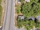 Overhead shot of the home, situated with a view of the street and surrounding foliage at 2373 Sorentrue Ave, North Charleston, SC 29405