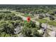 Scenic aerial view of a property with a large lot and mature trees, near a road with easy access at 2373 Sorentrue Ave, North Charleston, SC 29405