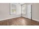 Bedroom with wood floors, natural light, and a neutral color scheme at 2373 Sorentrue Ave, North Charleston, SC 29405