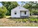 Charming single-story home with a well-manicured lawn and a cozy front porch, perfect for enjoying the outdoors at 2373 Sorentrue Ave, North Charleston, SC 29405