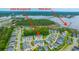An aerial view of 2402 Brackish Dr neighborhood featuring waterfront views and an HOA dock at 2402 Brackish Dr, Mount Pleasant, SC 29466