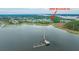 An aerial view shows a community with access to waterfront living on the coast at 2402 Brackish Dr, Mount Pleasant, SC 29466