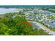 An aerial view shows the property nestled within a well-planned community surrounded by natural beauty at 2402 Brackish Dr, Mount Pleasant, SC 29466