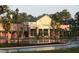 Well maintained commercial building featuring modern architectural design, lush landscaping and plenty of parking at 2402 Brackish Dr, Mount Pleasant, SC 29466