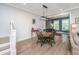 Casual dining area featuring a wooden table, modern lighting, and open floor plan at 2402 Brackish Dr, Mount Pleasant, SC 29466
