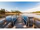 Picturesque wooden dock with metal railing offering stunning waterfront views and recreational opportunities at 2402 Brackish Dr, Mount Pleasant, SC 29466