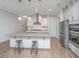 Contemporary kitchen with stainless steel appliances, granite countertops, and sleek white cabinetry at 2402 Brackish Dr, Mount Pleasant, SC 29466