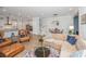 Bright open-concept living area with kitchen, dining, and relaxed seating arrangements at 2402 Brackish Dr, Mount Pleasant, SC 29466