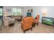 Inviting living room with a comfortable sofa, stylish armchairs, and contemporary decor at 2402 Brackish Dr, Mount Pleasant, SC 29466