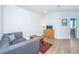 Cozy living room features a grey sofa, wooden coffee table, and decor, creating an inviting space at 2402 Brackish Dr, Mount Pleasant, SC 29466