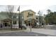 A Lowes Foods retail shopping center exterior view showing front entrance and parking lot at 2402 Brackish Dr, Mount Pleasant, SC 29466