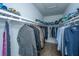 Well-organized walk-in closet with ample hanging space and shelving for clothes and accessories at 2402 Brackish Dr, Mount Pleasant, SC 29466