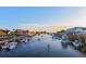 Vibrant waterfront scene with boats, restaurants, and people enjoying the scenic views and activities at 2402 Brackish Dr, Mount Pleasant, SC 29466