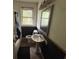 Bathroom featuring a bathtub, toilet, pedestal sink, and vanity mirror at 2601 Oregon Ave, North Charleston, SC 29405