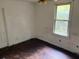 Bedroom featuring hardwood floors and natural light at 2601 Oregon Ave, North Charleston, SC 29405