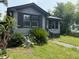 Charming one-story home with inviting front lawn and gray siding at 2601 Oregon Ave, North Charleston, SC 29405