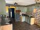 A kitchen with tile floors and ample counter space at 2601 Oregon Ave, North Charleston, SC 29405